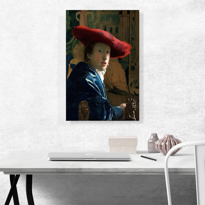 A beautiful canvas print of a girl wearing a striking red hat, showcasing elegance and artistic flair.