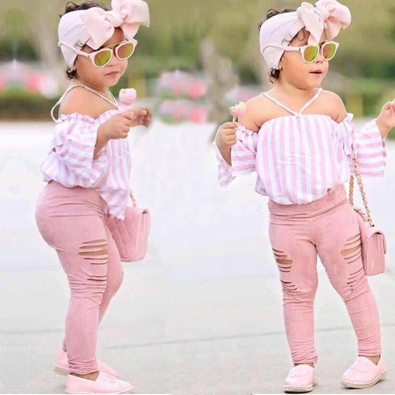 Girls Clothing Set featuring an off-shoulder striped shirt, matching pants, and a headband, perfect for summer wear.