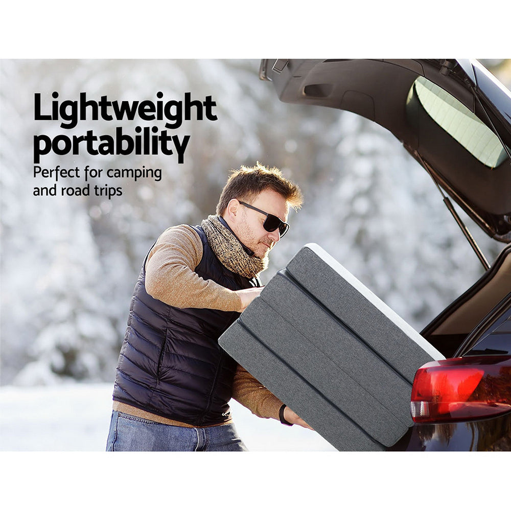 Giselle Bedding Folding Mattress in dark grey, showcasing its foldable design and soft faux linen fabric.