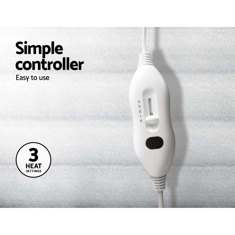 Giselle Bedding King Size Electric Blanket in white, showcasing its soft polyester fabric and dual remote controls.