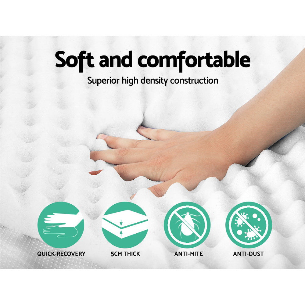 Giselle Bedding Egg Crate Foam Mattress Topper showcasing its unique design and thickness for enhanced comfort.