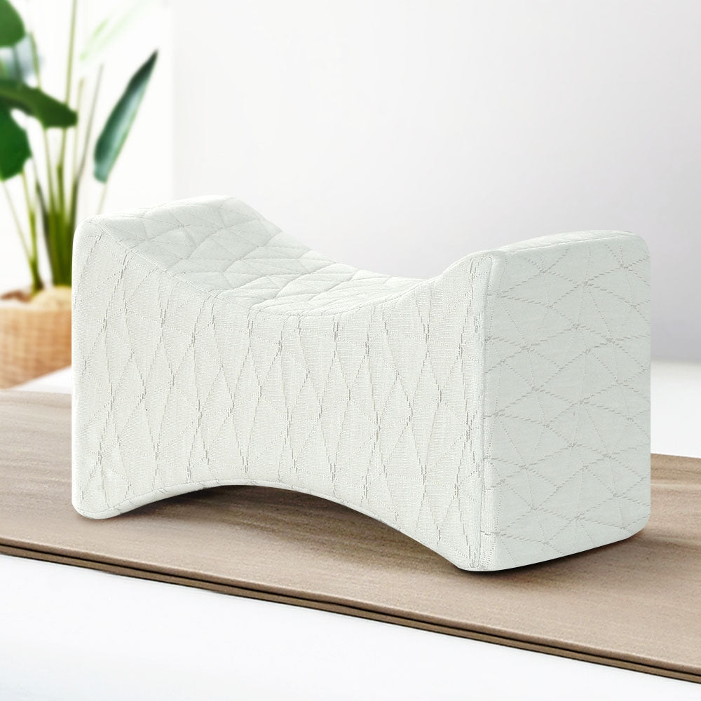 Giselle Bedding Memory Foam Pillow designed for knee support, featuring ergonomic contour and soft rayon cover.