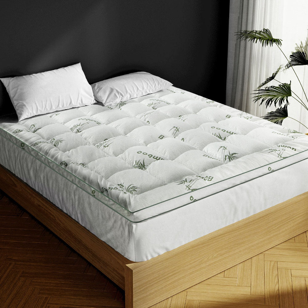 Giselle Pillowtop Mattress Topper featuring bamboo fabric and plush filling, designed for comfort and breathability.