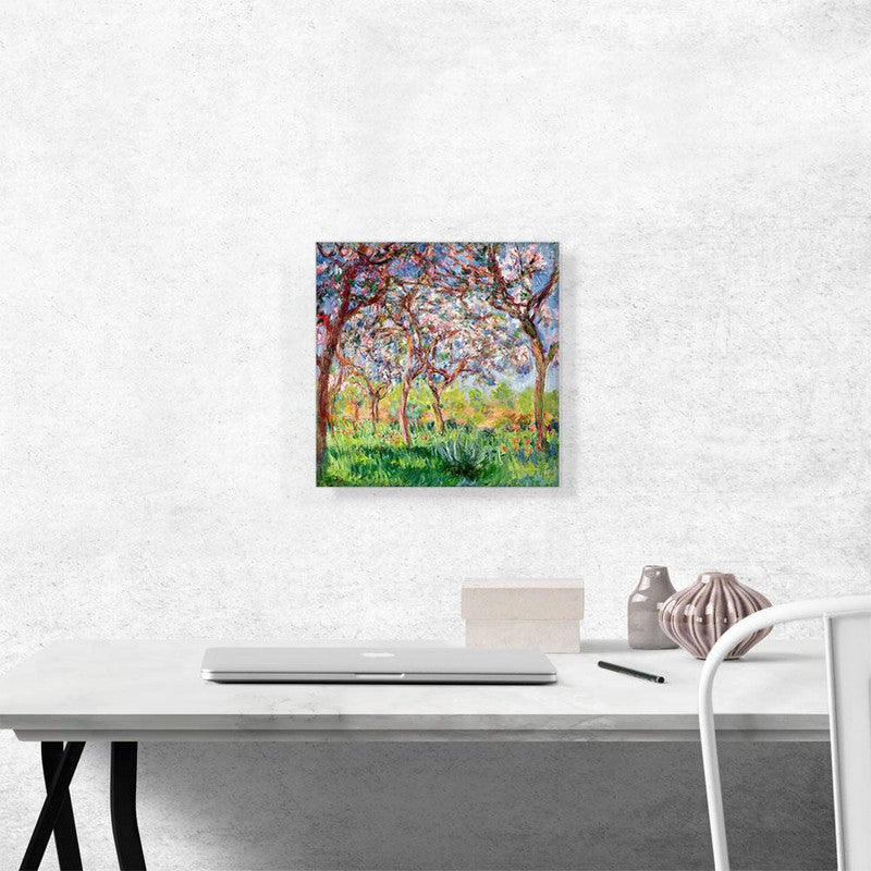A vibrant canvas print depicting Giverny in Springtime, showcasing blooming flowers and lush greenery.