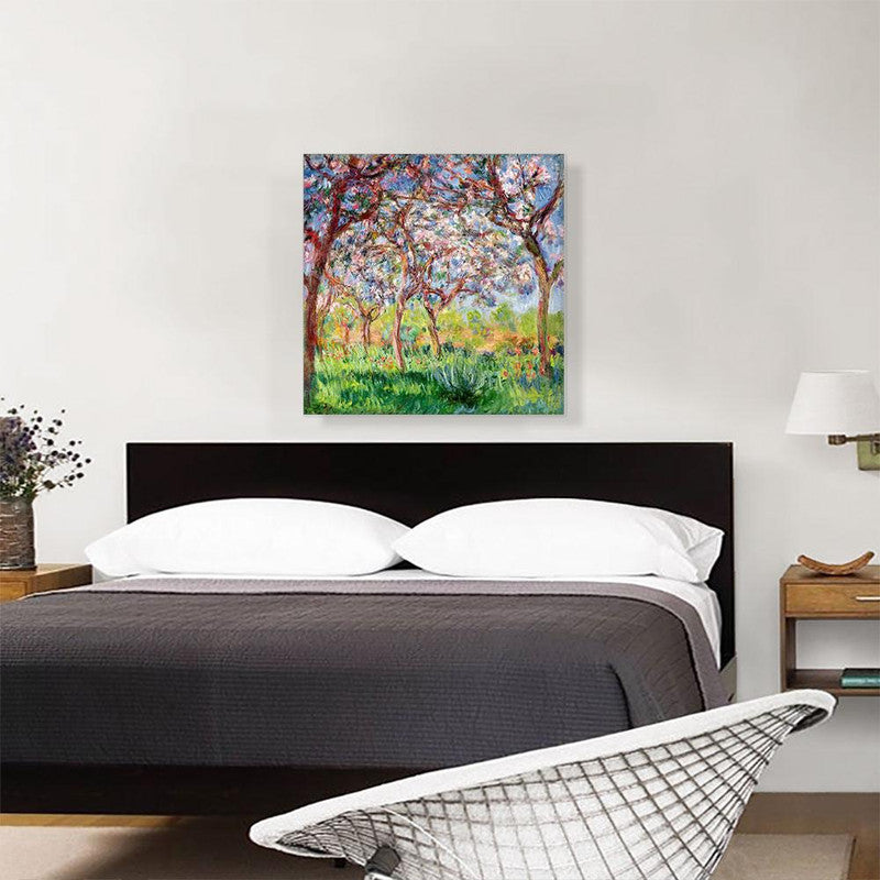 A vibrant canvas print depicting Giverny in Springtime, showcasing blooming flowers and lush greenery.