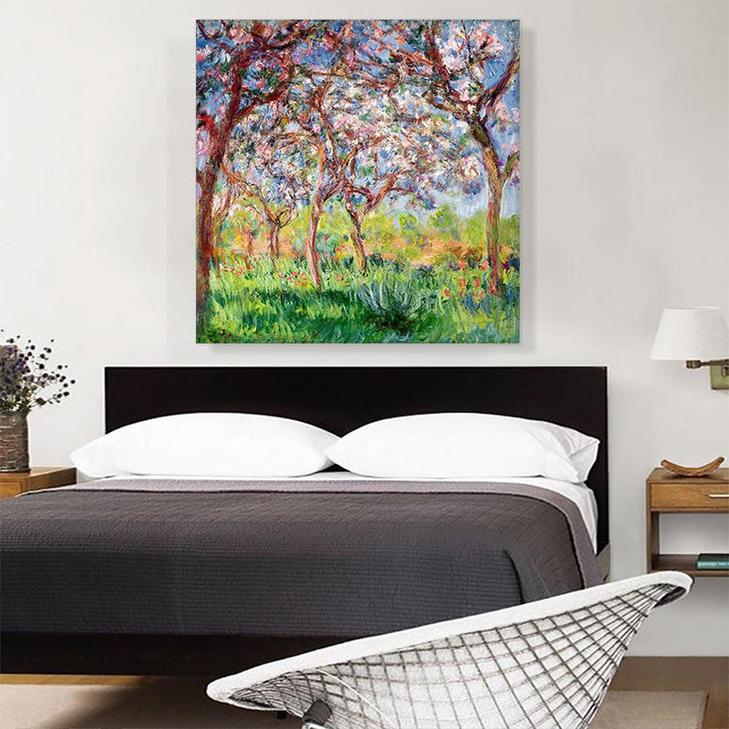 A vibrant canvas print depicting Giverny in Springtime, showcasing blooming flowers and lush greenery.