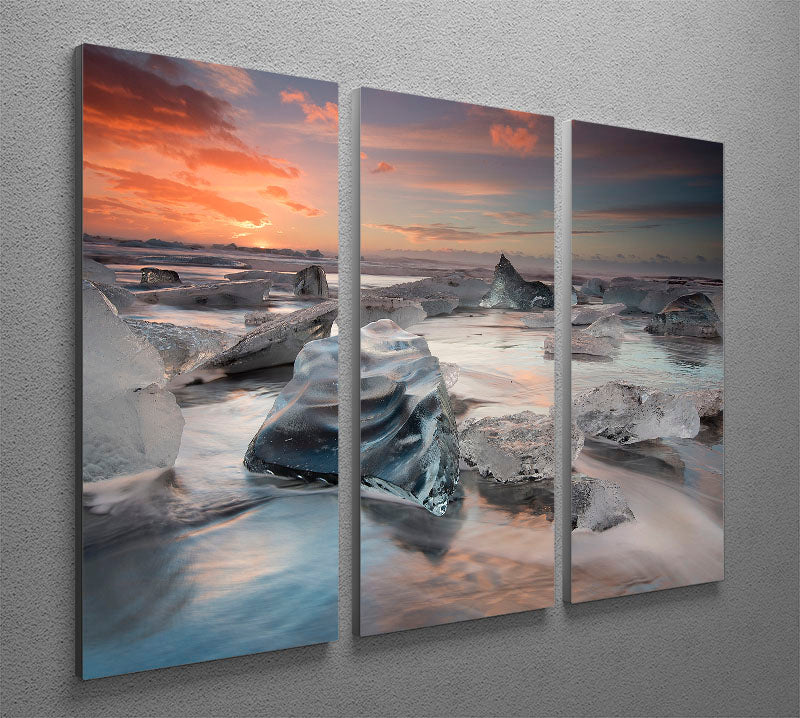 A stunning 3-panel canvas print featuring a serene glacial lagoon beach scene, perfect for home decor.