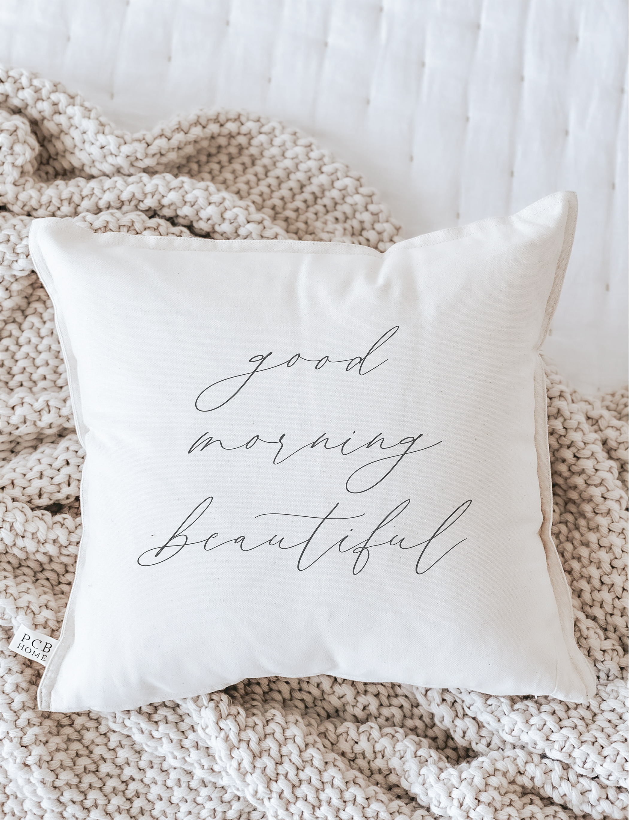 Good Morning Beautiful Pillow featuring elegant calligraphy on soft cotton fabric, available in white and natural colors.