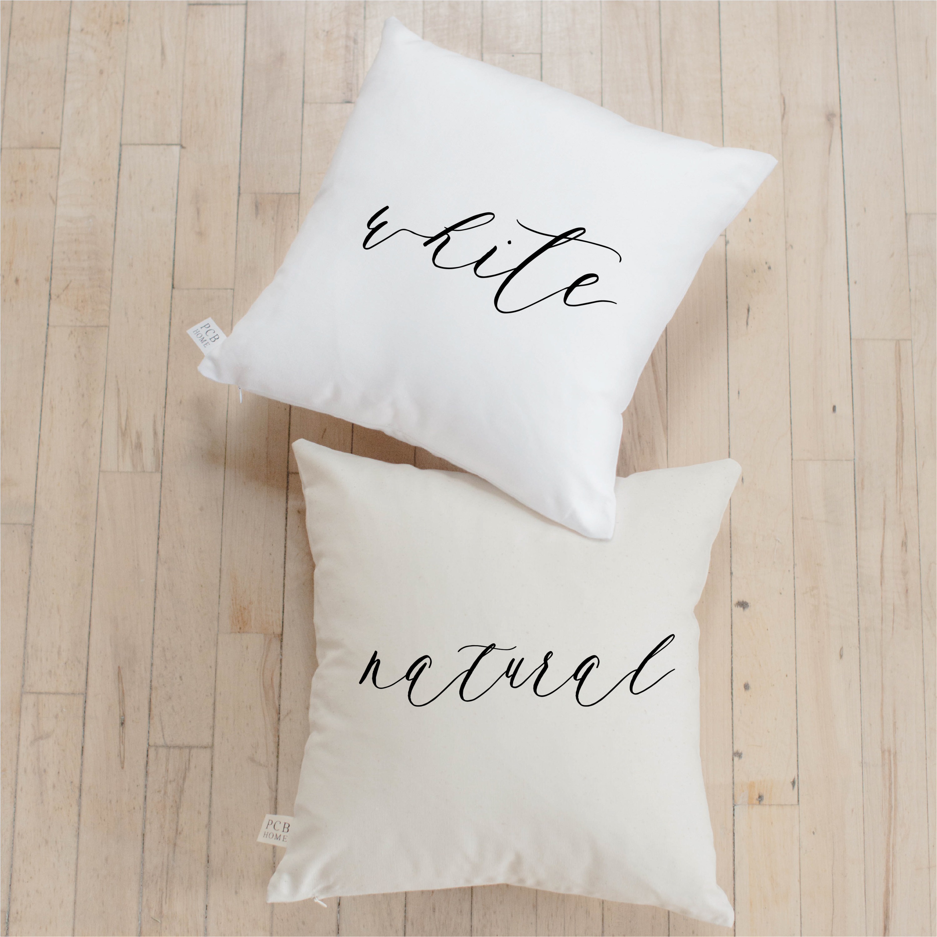 Good Morning Beautiful Pillow featuring elegant calligraphy on soft cotton fabric, available in white and natural colors.