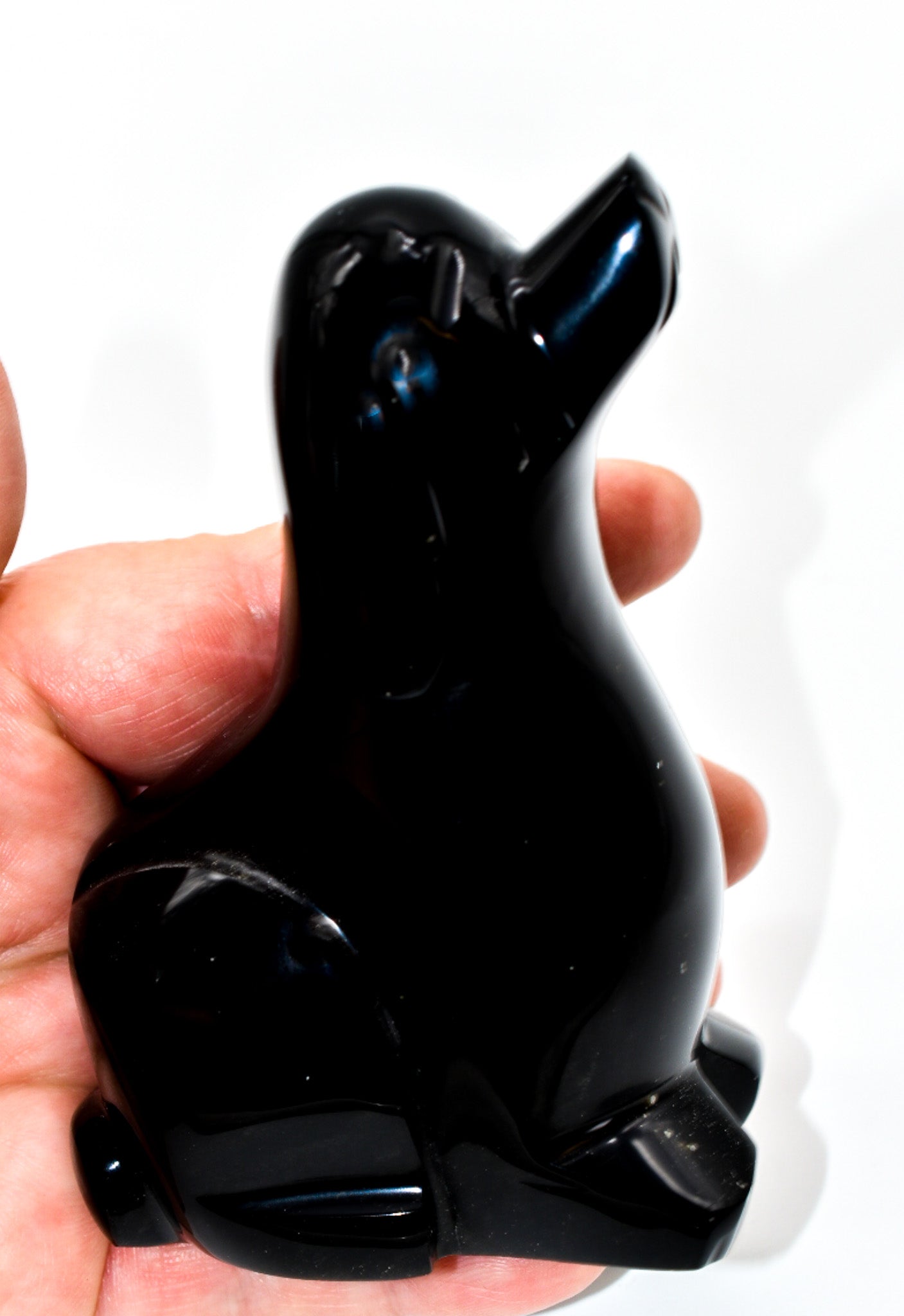 A beautifully crafted Gold Sheen Large Obsidian Dog figurine, showcasing its unique gold sheen and intricate details.