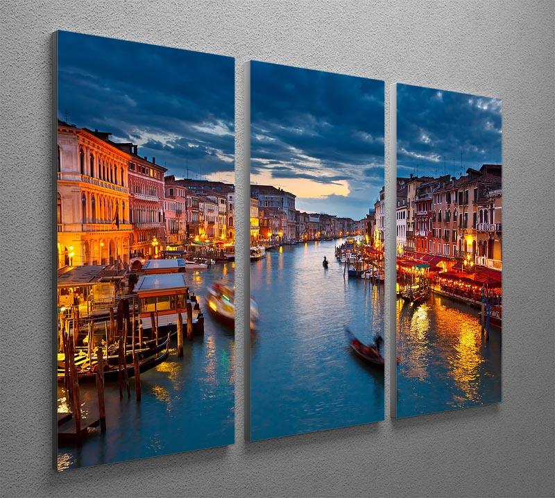 A beautiful 3-panel canvas print depicting the Grand Canal in Venice at night, showcasing vibrant colors and intricate details.