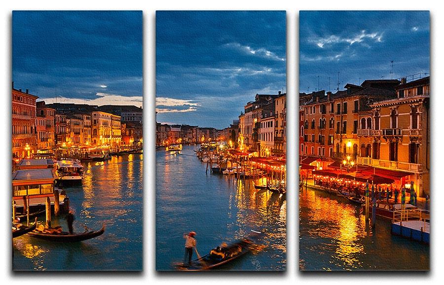 A stunning 3-panel canvas print depicting the Grand Canal in Venice at night, showcasing illuminated buildings and serene water reflections.