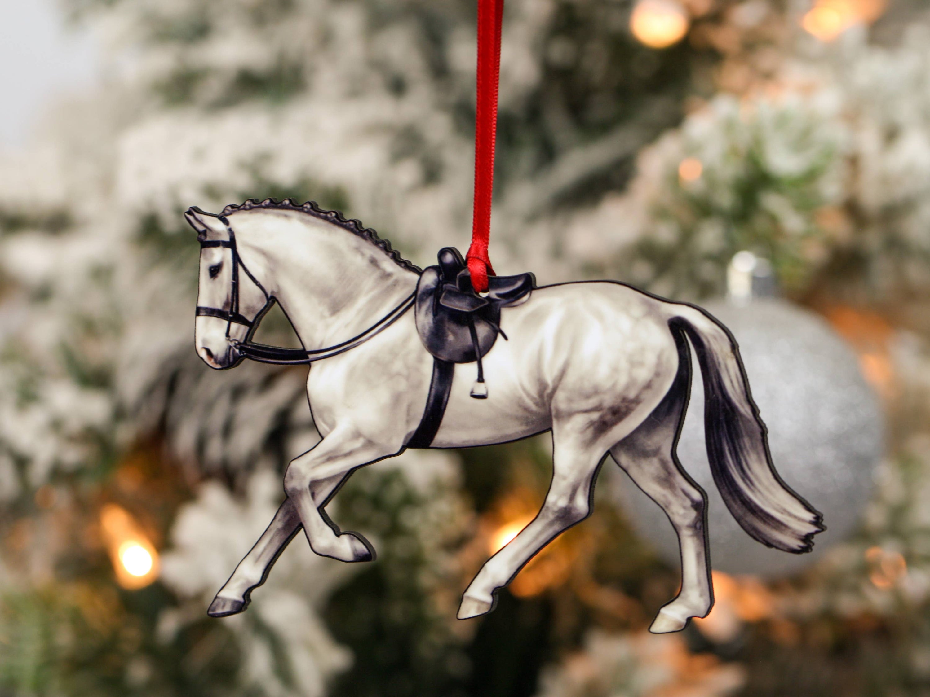 Gray Horse Christmas Decoration, a side saddle ornament made of composite wood, featuring a glossy front and dark brown back, perfect for holiday decor.