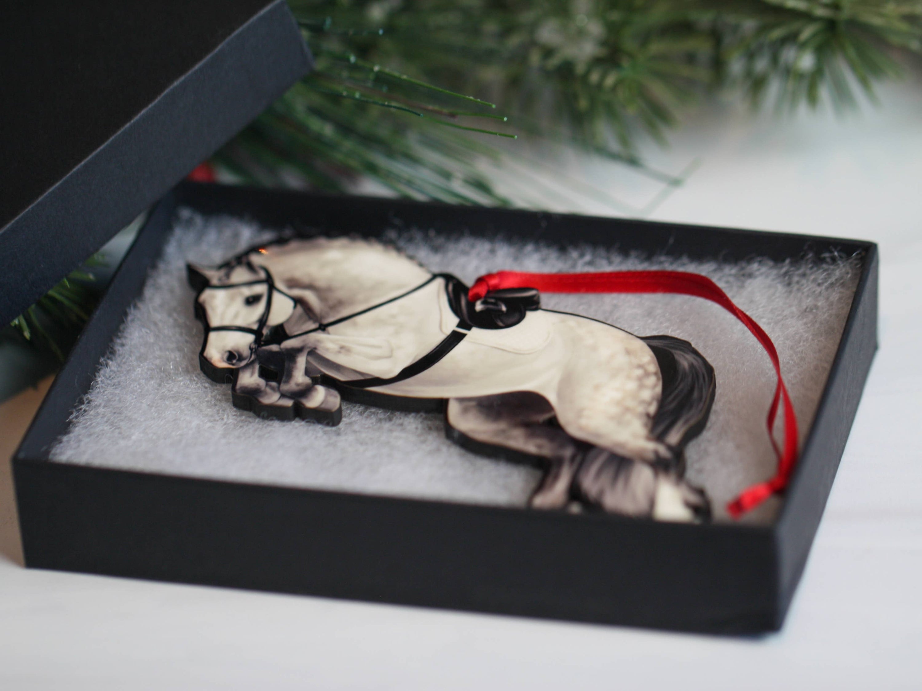 Gray Hunter Equestrian Decor Jumping Horse Ornament with braided mane, featuring a glossy front and dark brown back, perfect for holiday decor.