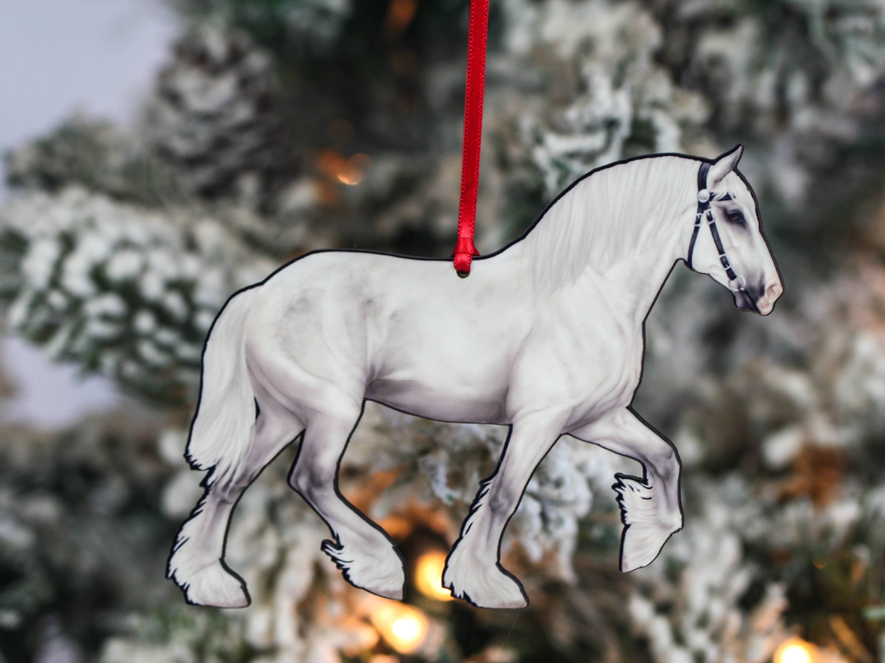 Gray Shire Draft Horse Christmas Ornament with red and black ribbons, showcasing intricate laser-cut design on composite wood.