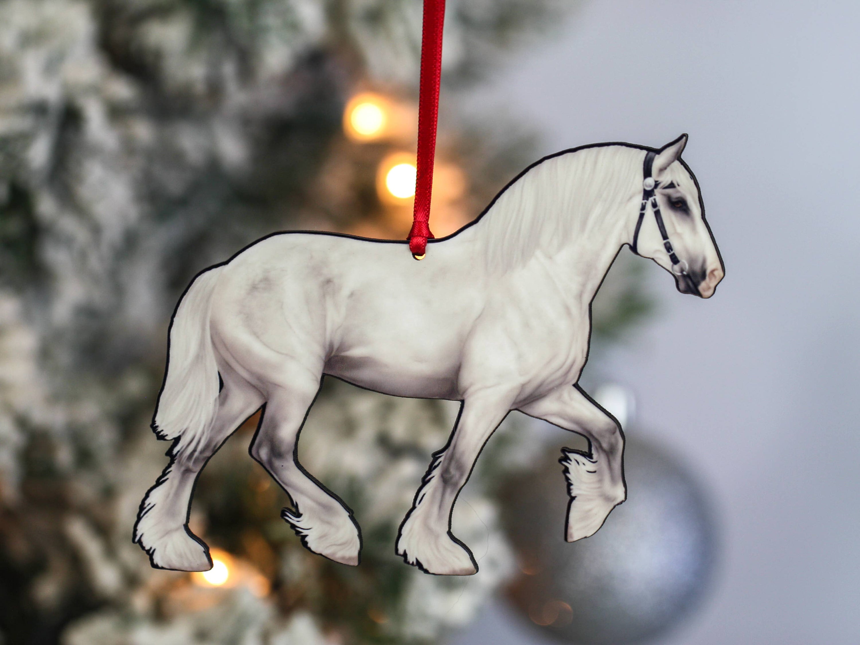 Gray Shire Draft Horse Christmas Ornament with red and black ribbons, showcasing intricate laser-cut design on composite wood.