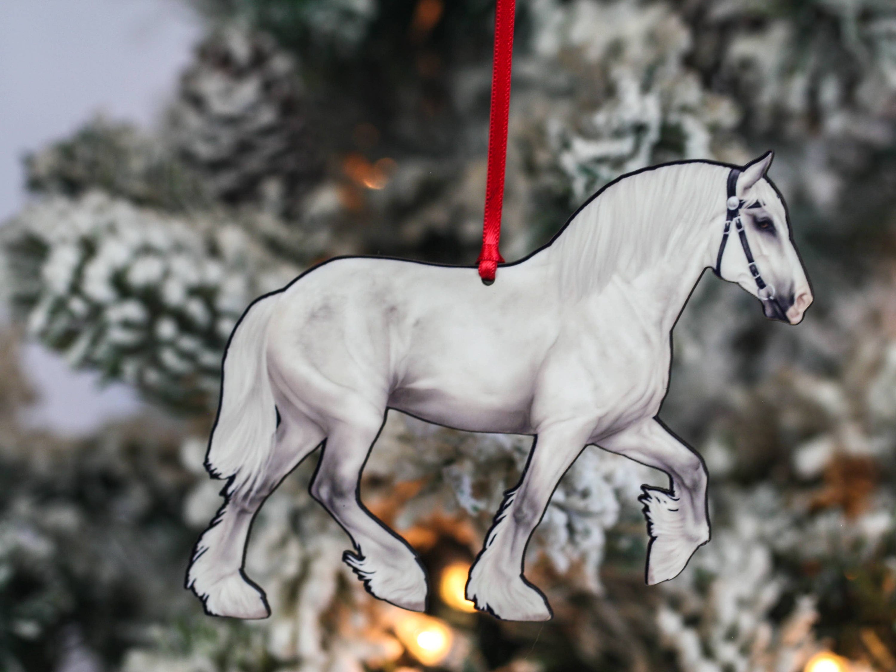 Gray Shire Draft Horse Christmas Ornament with red and black ribbons, showcasing intricate laser-cut design on composite wood.