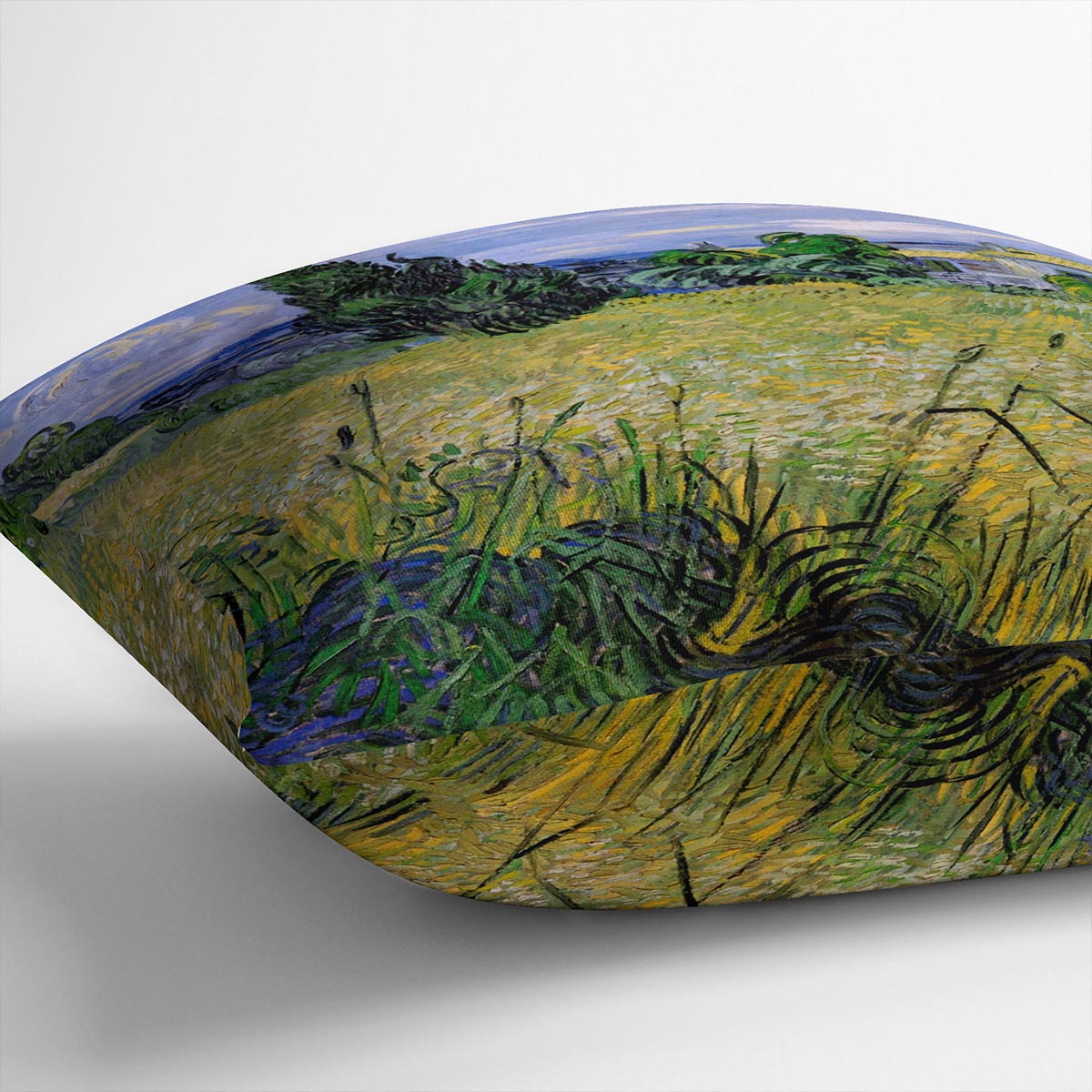 A vibrant cushion featuring Van Gogh's Green Wheat Field with Cypress design, made from luxurious vegan faux suede.