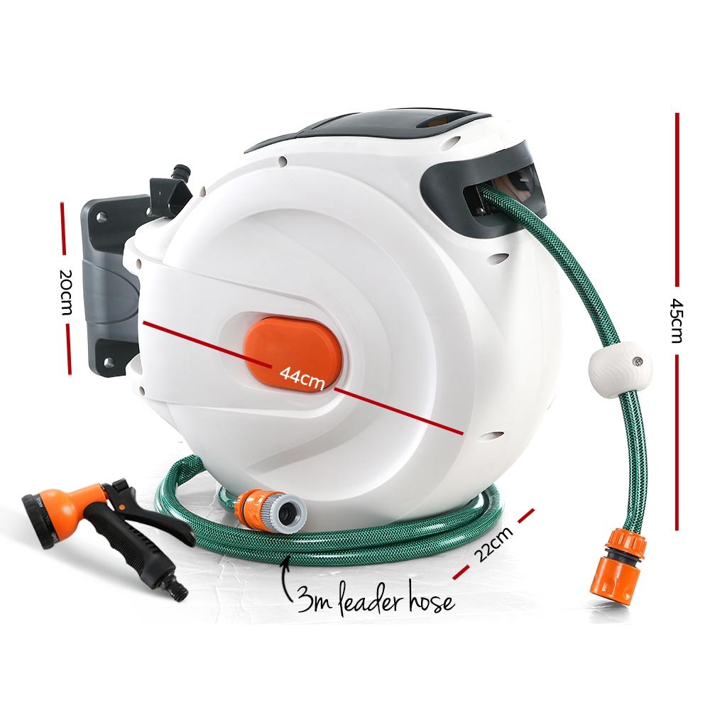 Greenfingers Retractable Hose Reel with 30M hose and spray gun, showcasing a compact design and wall-mounted feature.