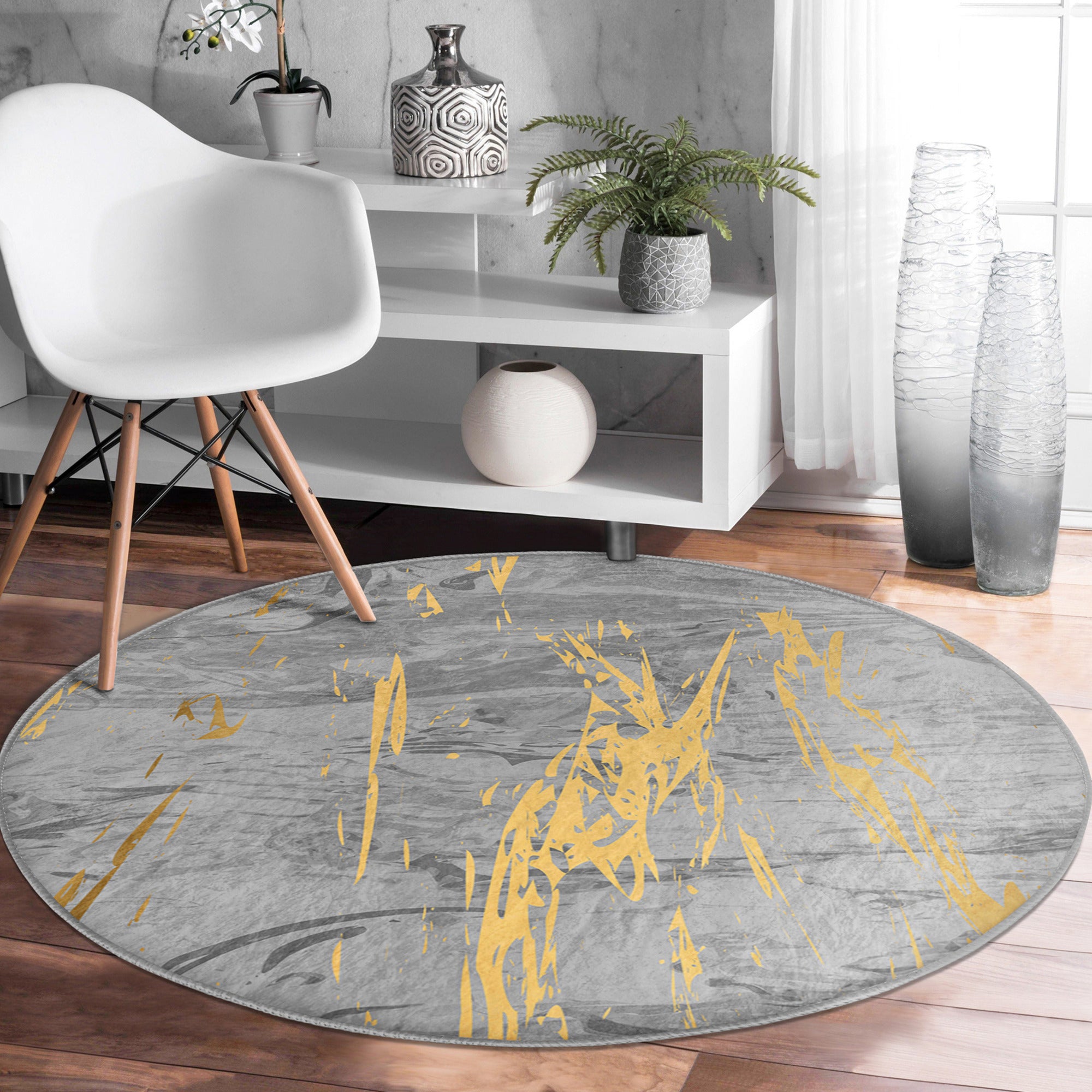 A stylish grey marble pattern round rug with gold lines, showcasing its soft velvet texture and elegant design, perfect for home decor.