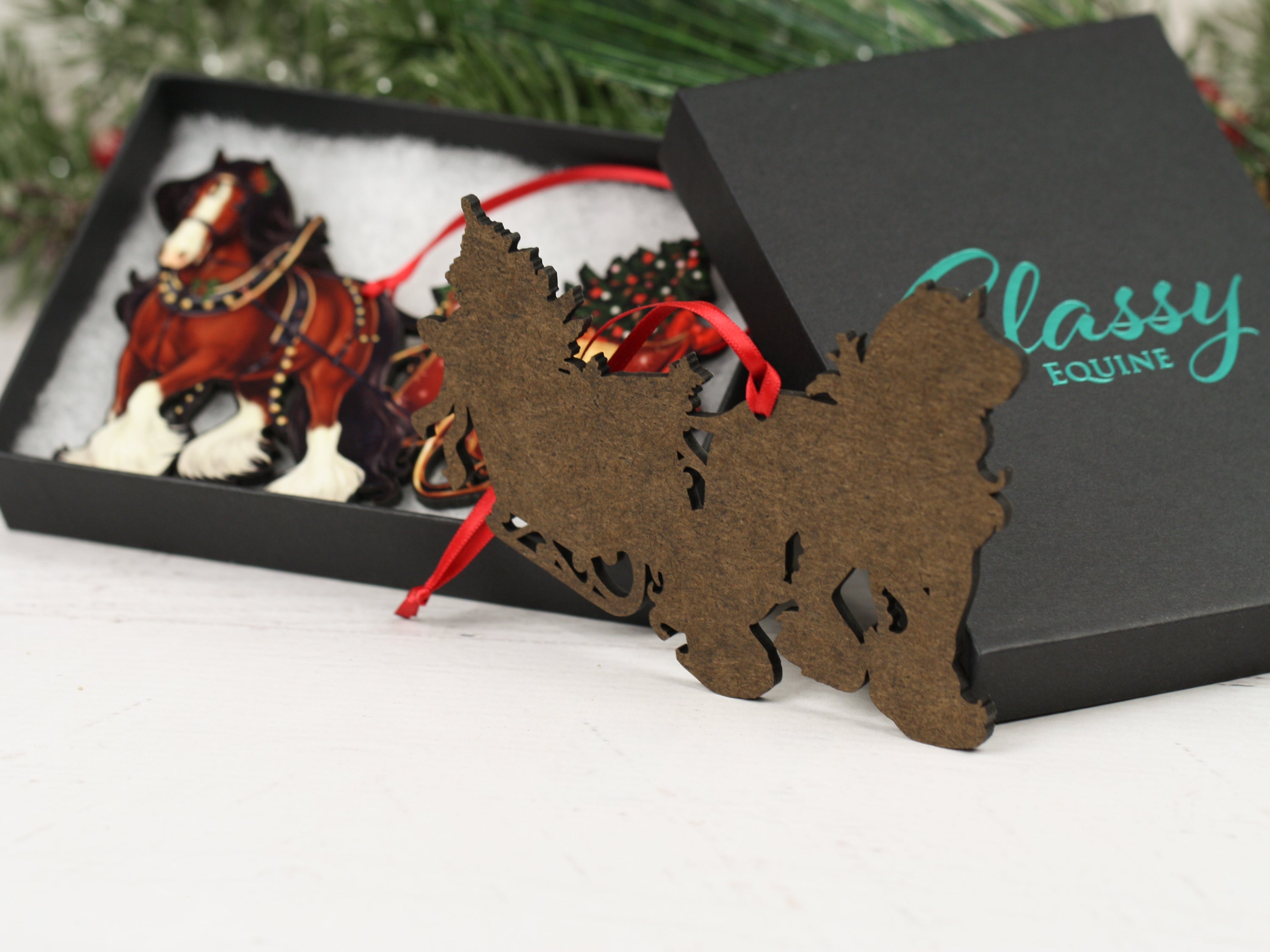 Gypsy Cob Horse Christmas Ornament featuring a blue roan horse pulling a sleigh, handmade from composite wood with a glossy finish.