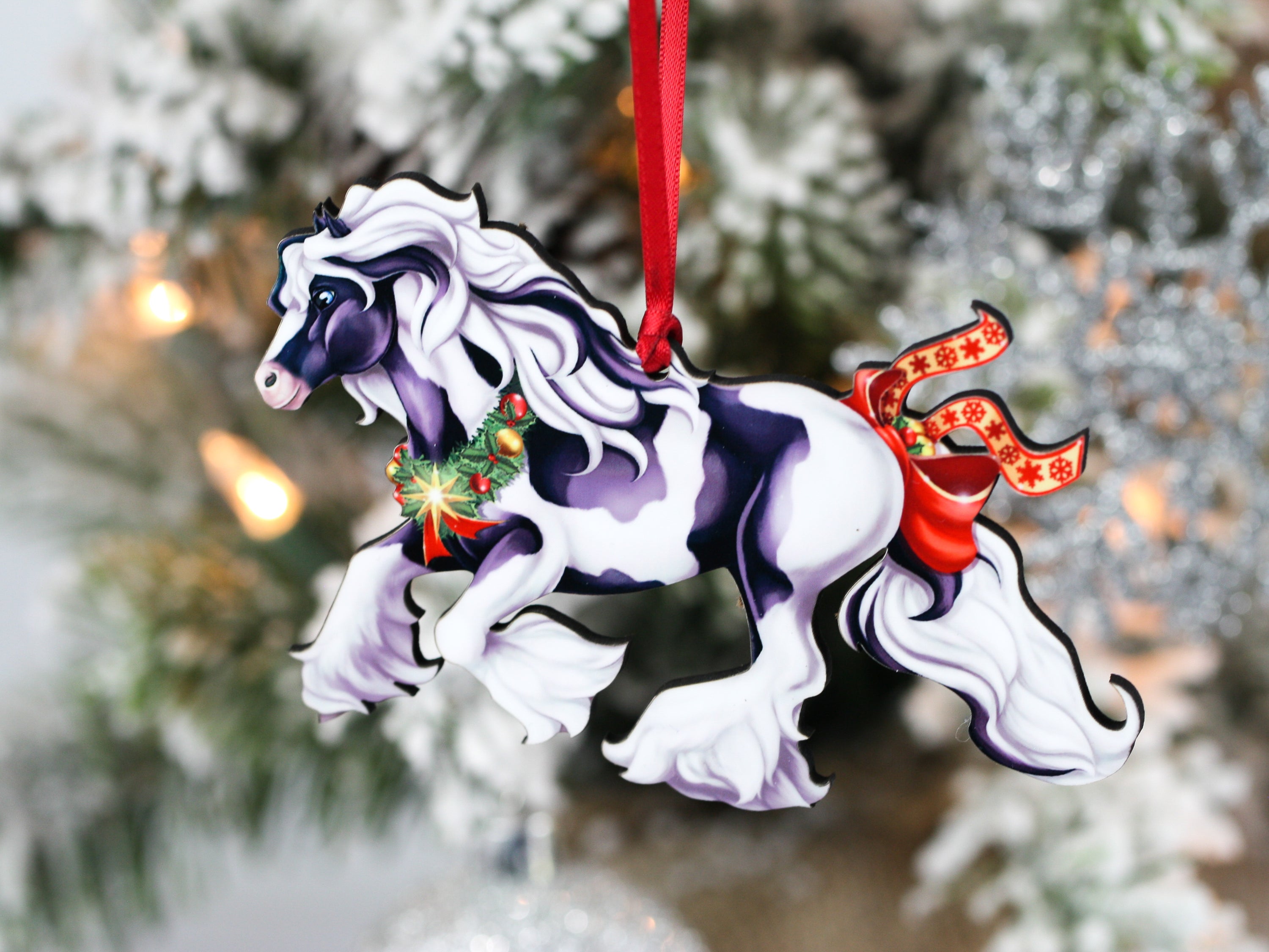 Gypsy Vanner Horse Christmas Ornament featuring a cantering tobiano design with festive decorations.