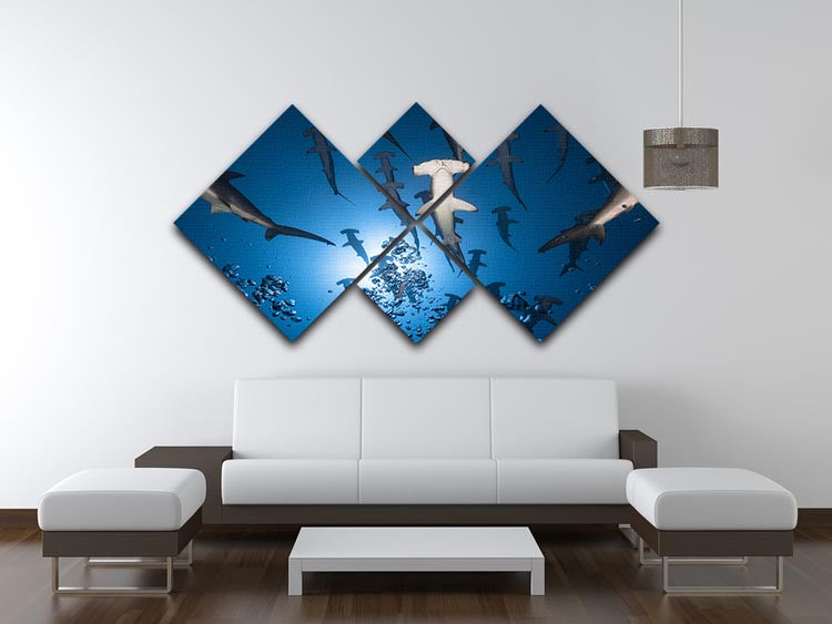 A stunning multi-panel canvas artwork featuring a hammerhead shark, divided into four equal square sections, showcasing vibrant colors and intricate details.