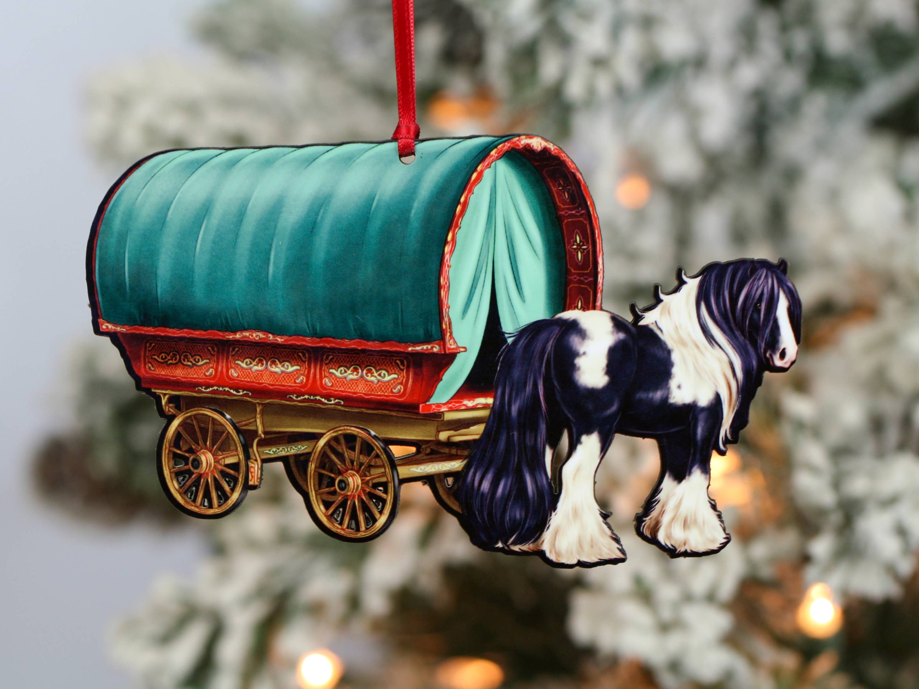 Handcrafted Gypsy Cob horse wagon ornament in black and white, featuring intricate details and glossy finish, perfect for Christmas decor.