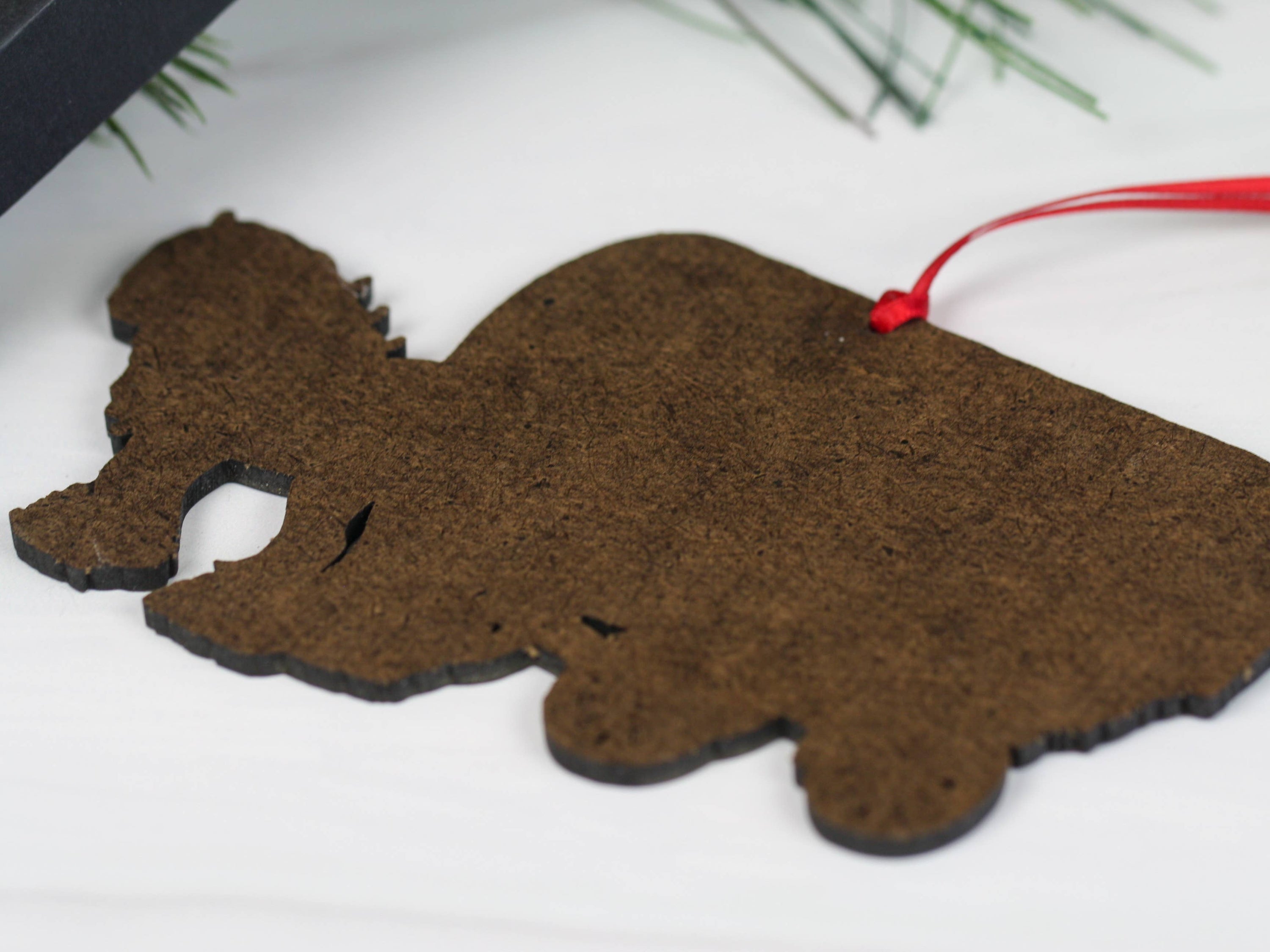 Handcrafted Gypsy Cob horse wagon ornament in black and white, featuring intricate details and glossy finish, perfect for Christmas decor.