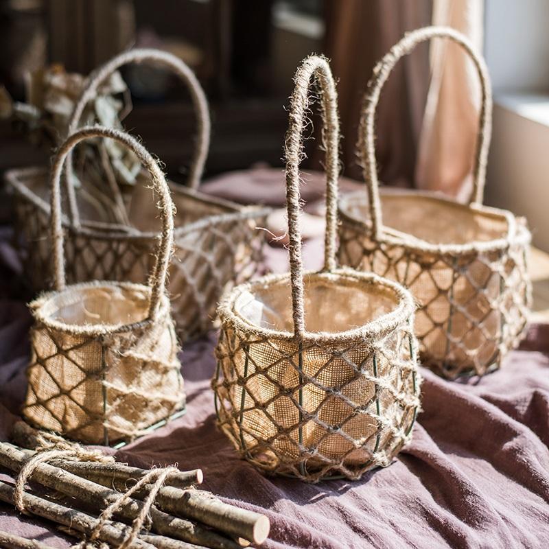 A set of three handmade hemp baskets in various sizes and colors, showcasing their natural texture and eco-friendly design.
