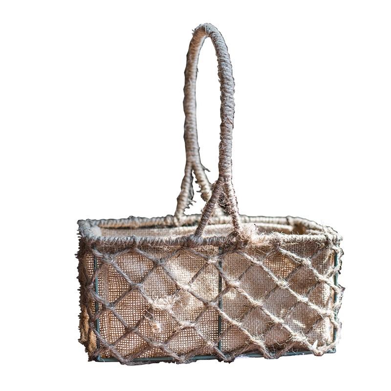 A set of three handmade hemp baskets in various sizes and colors, showcasing their natural texture and eco-friendly design.