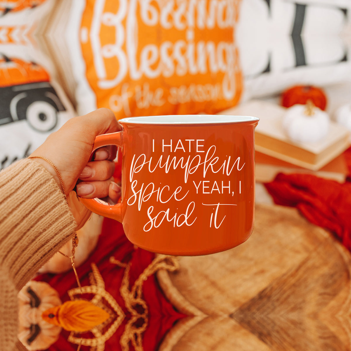 Hate Pumpkin Mug in vibrant orange with white lettering, featuring the phrase 'I hate pumpkin spice, yeah I said it' on both sides.