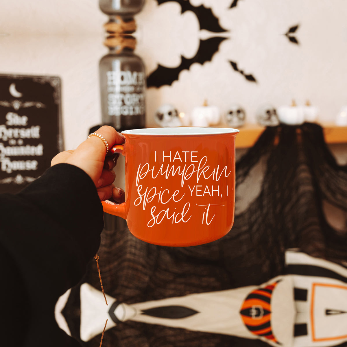 Hate Pumpkin Mug in vibrant orange with white lettering, featuring the phrase 'I hate pumpkin spice, yeah I said it' on both sides.
