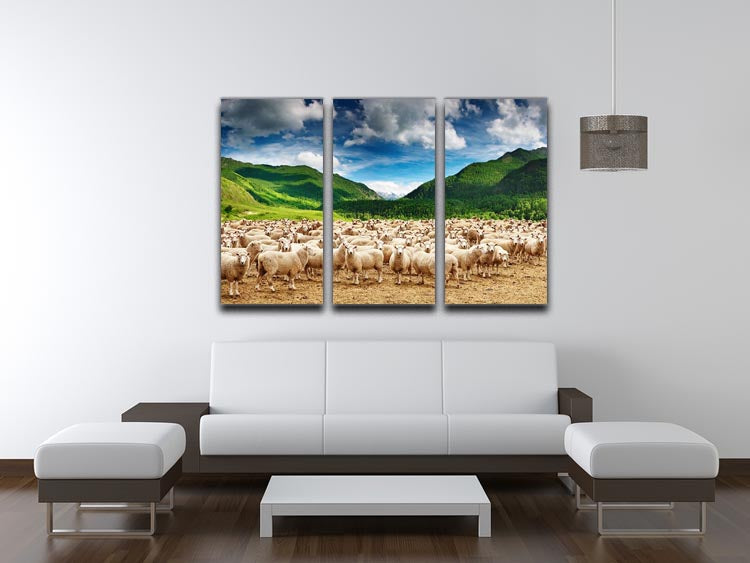 A beautiful 3-panel canvas print featuring a herd of sheep grazing in a serene landscape, perfect for home decor.