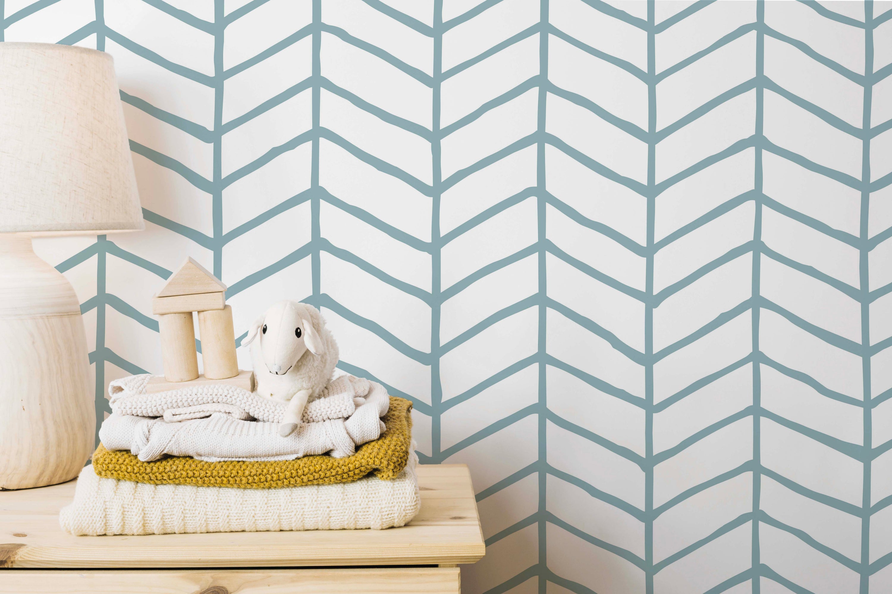 Elegant Herringbone wallpaper in neutral tones, showcasing a classic design suitable for various home decor styles.