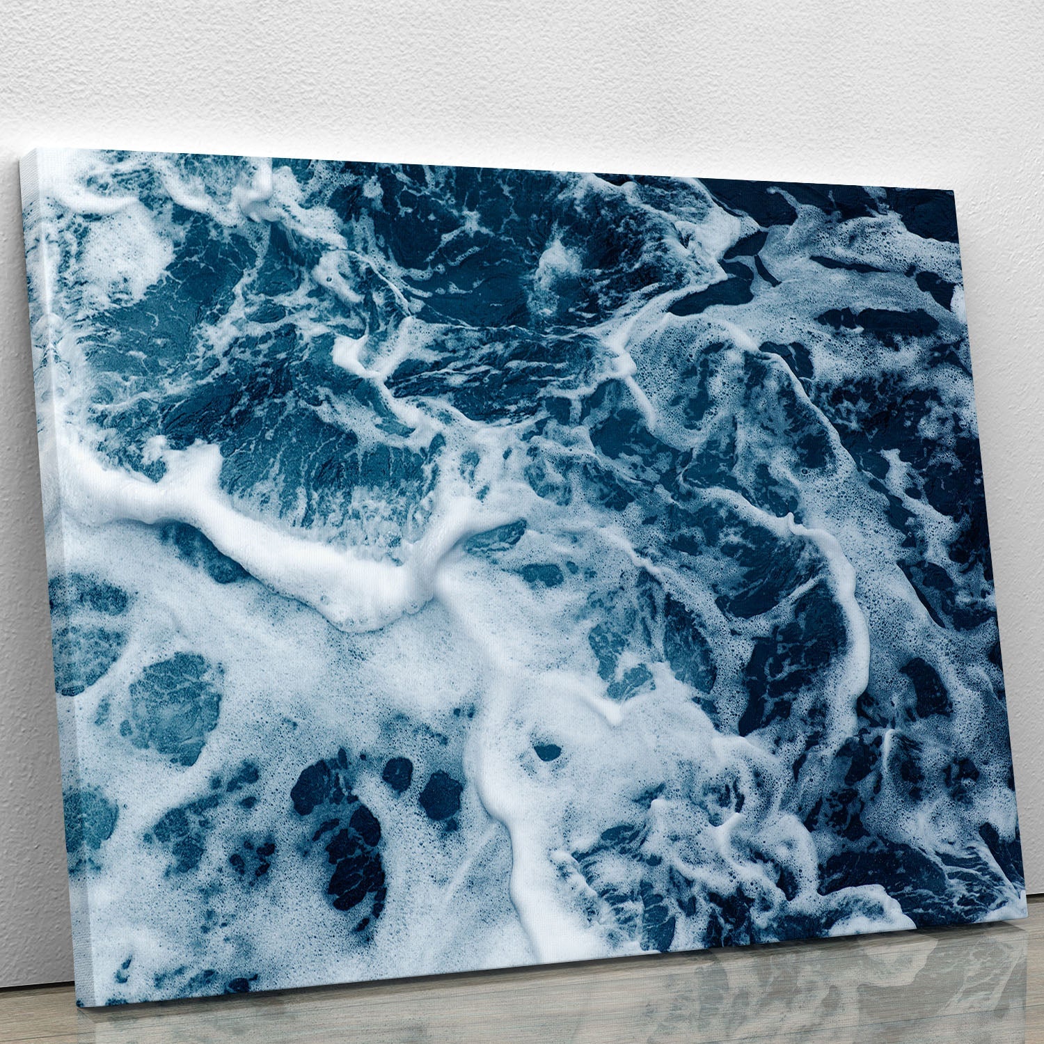 High angle view of rippled water captured in a canvas print, showcasing serene blue tones and fluid patterns.