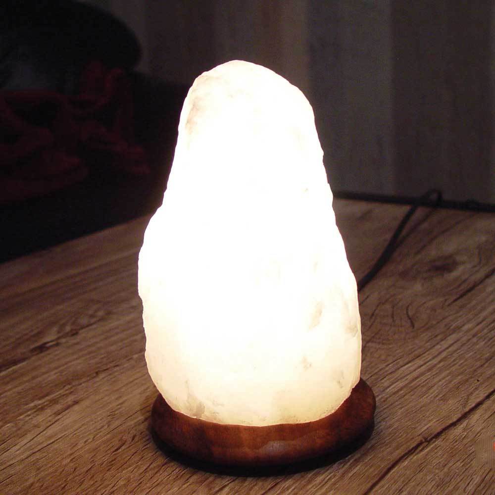 Himalayan White Rock Salt Lamp with a natural shape, glowing softly, showcasing its unique crystal texture and warm light.