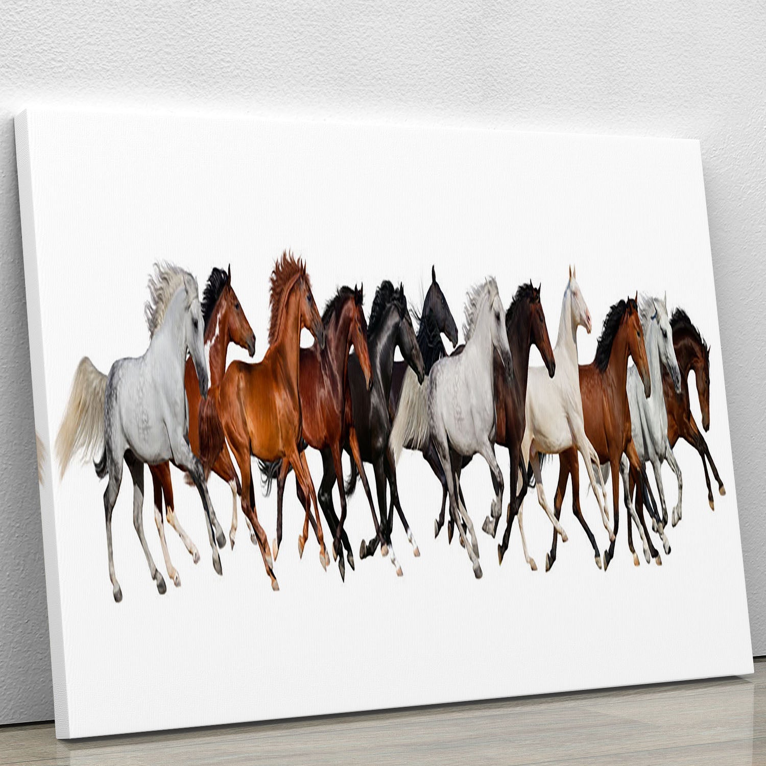 A beautiful canvas print featuring a herd of horses running freely in a natural setting, showcasing their grace and power.