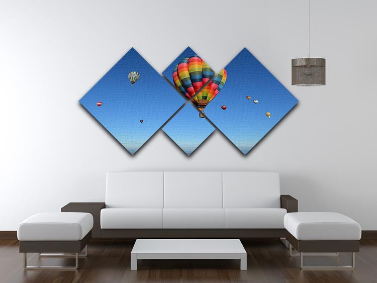 A vibrant 4-panel canvas artwork featuring colorful hot air balloons in a blue sky, showcasing adventure and beauty.