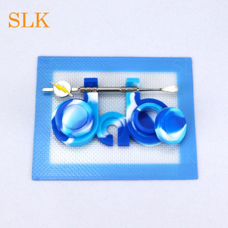 Hot Sale Dab Tool Kit featuring silicone pad mat and silicone dab jars in various colors, ideal for wax and oil storage.
