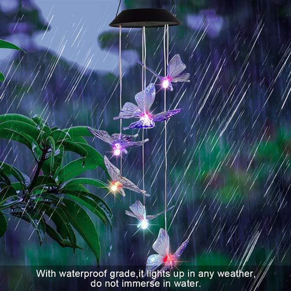 Colorful Solar Intelligent Light Control Wind Chime hanging in a garden, showcasing its vibrant lights and durable design.
