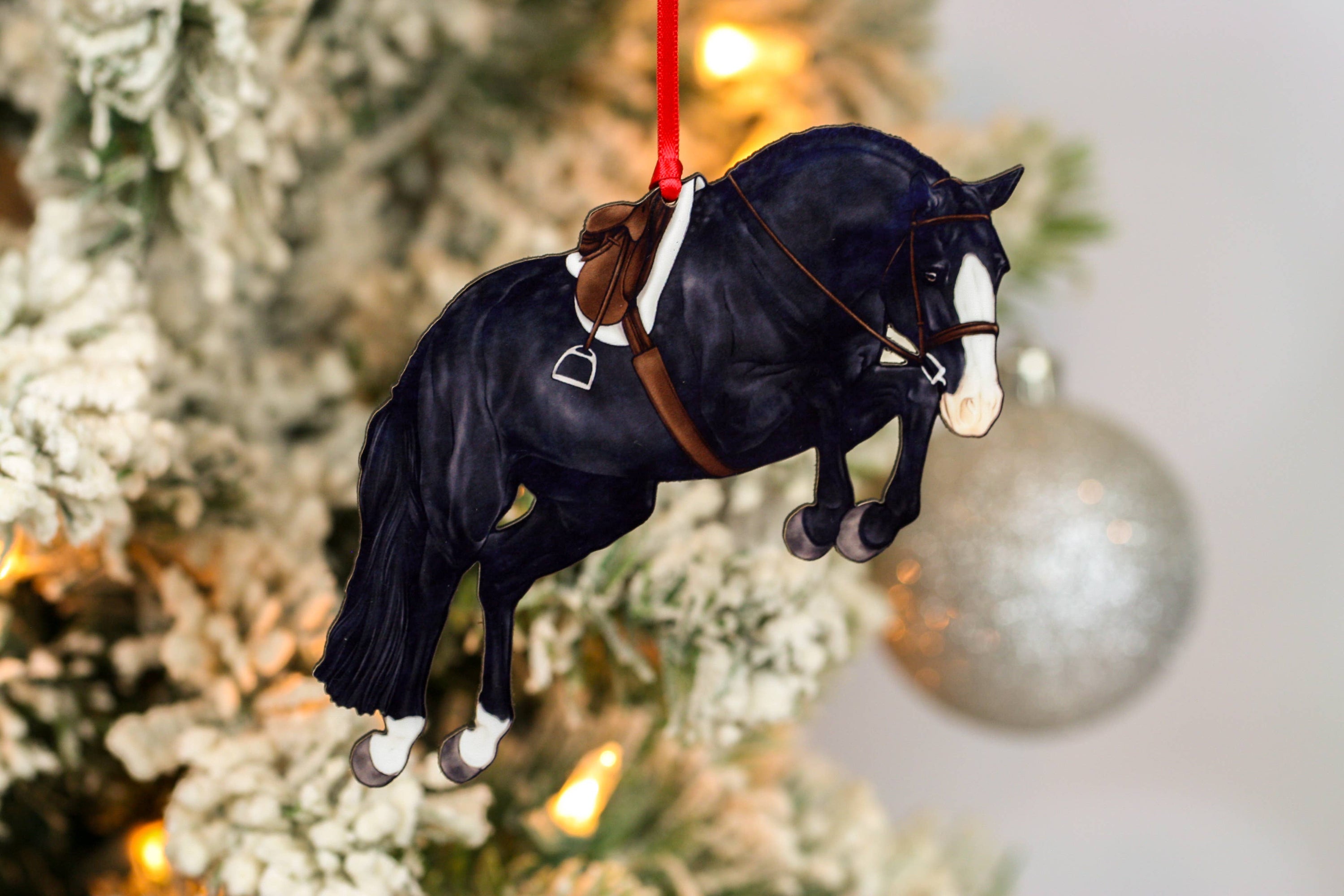 Hunter Jumper Horse Christmas Ornament featuring a black sport horse with red and black ribbons, handmade from composite wood.