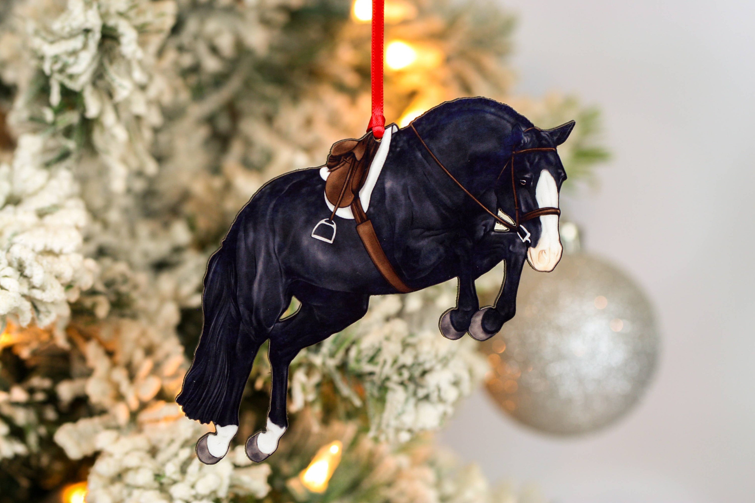 Hunter Jumper Horse Christmas Ornament featuring a black sport horse with red and black ribbons, handmade from composite wood.