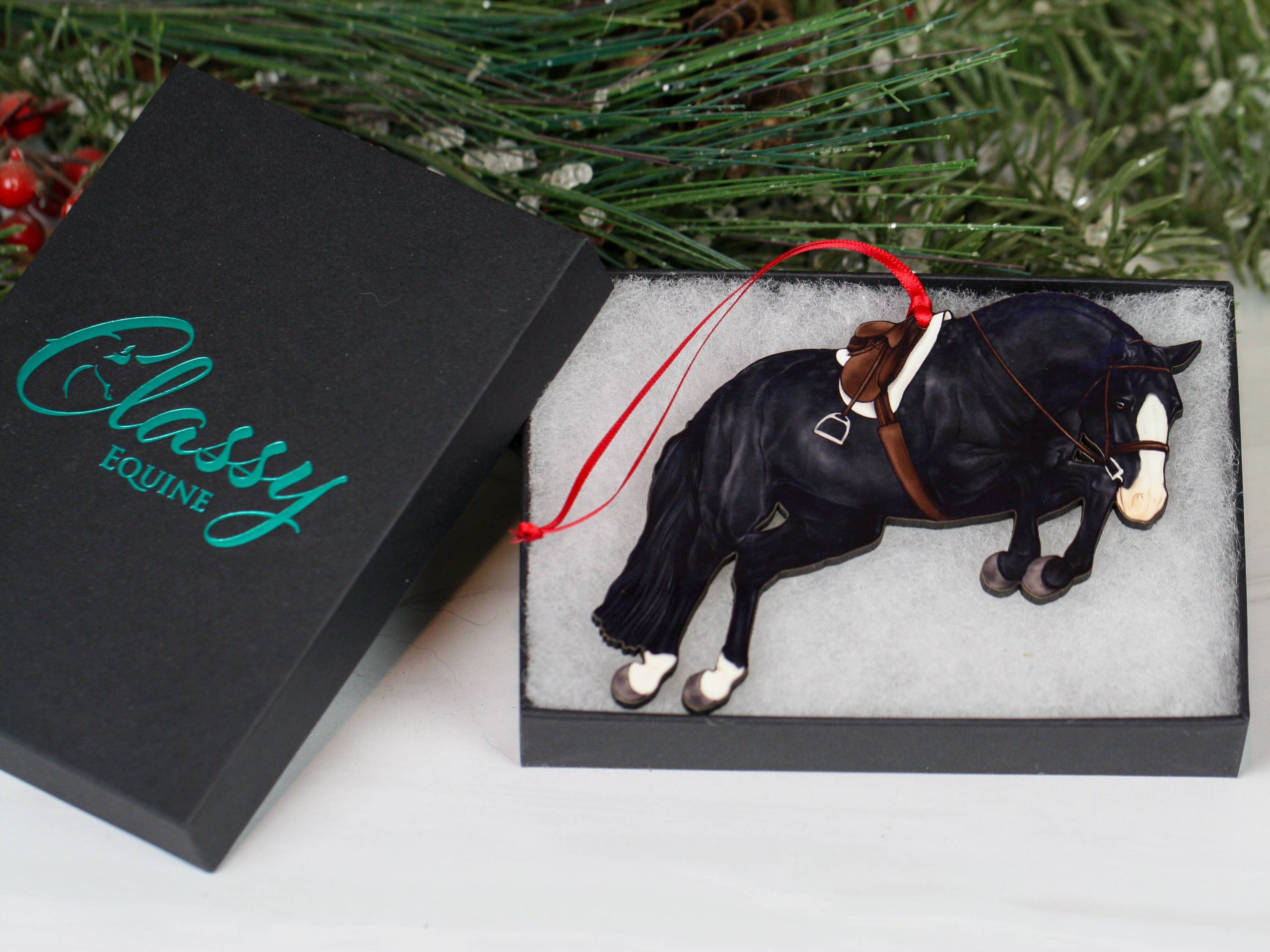Hunter Jumper Horse Christmas Ornament featuring a black sport horse with red and black ribbons, handmade from composite wood.