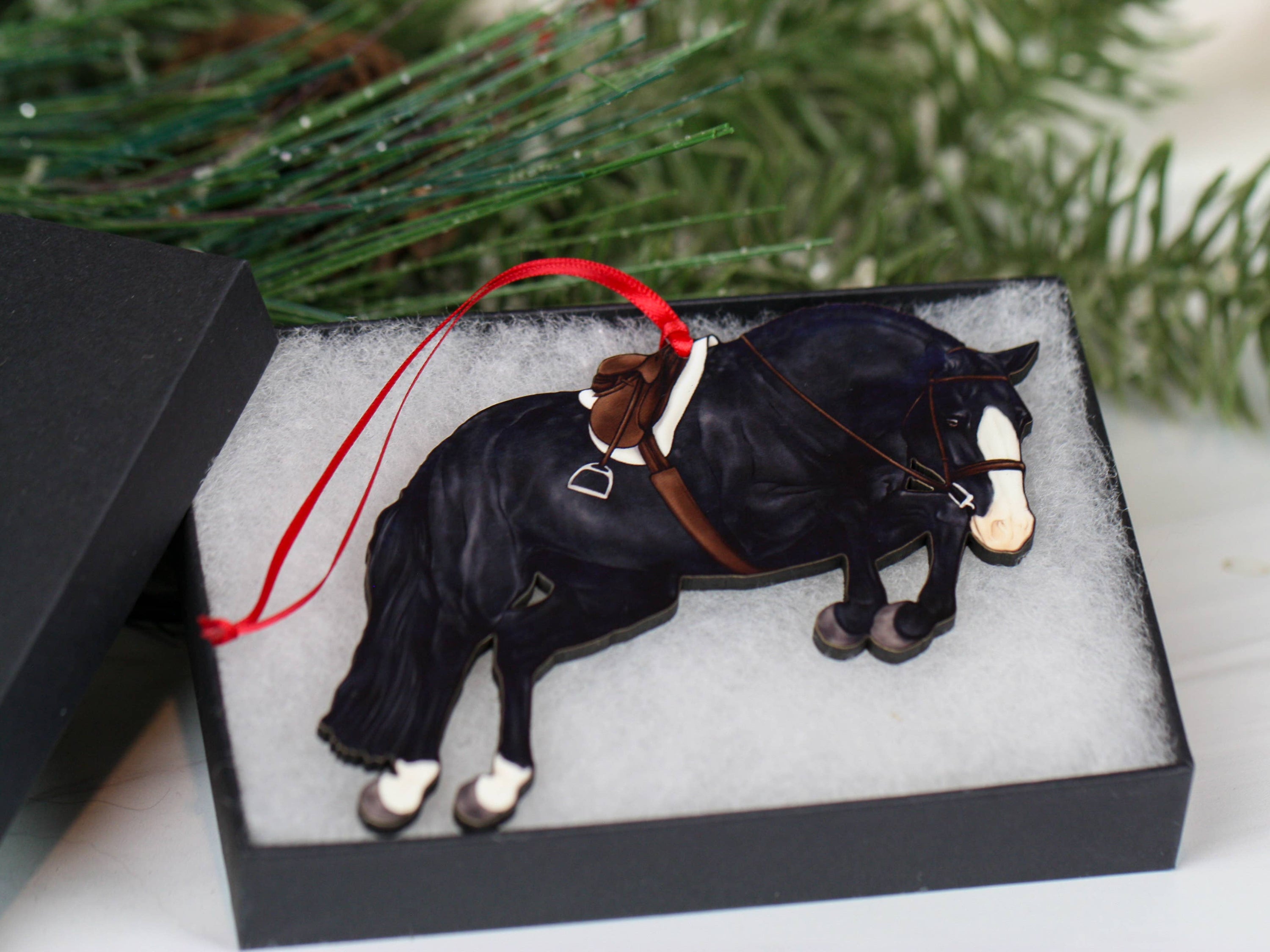 Hunter Jumper Horse Christmas Ornament featuring a black sport horse with red and black ribbons, handmade from composite wood.