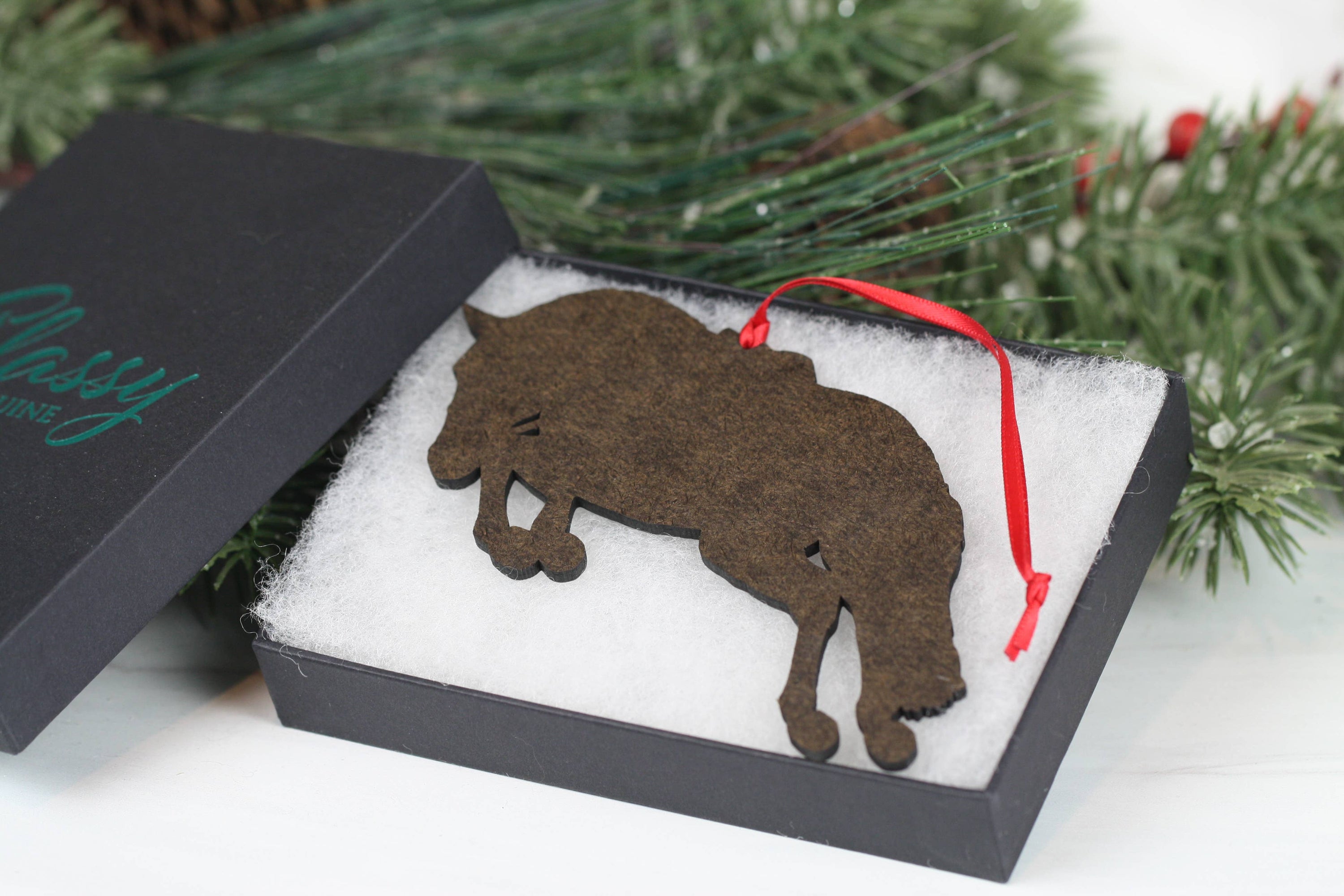 Hunter Jumper Horse Christmas Ornament featuring a black sport horse with red and black ribbons, handmade from composite wood.