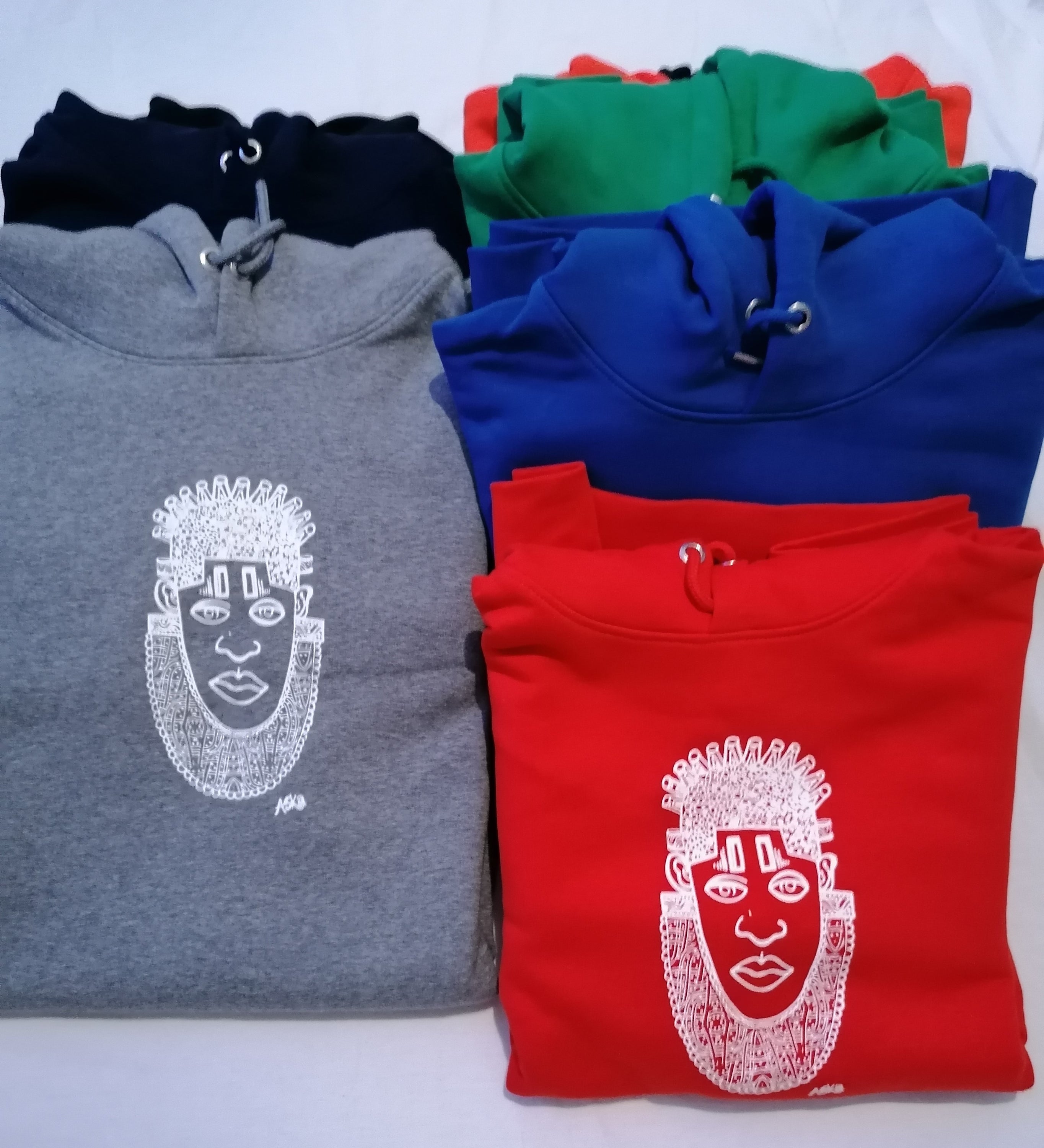 IDIA African Inspired Hoodie in vibrant red featuring white screen printed art of Queen IDIA, showcasing cultural heritage and contemporary fashion.