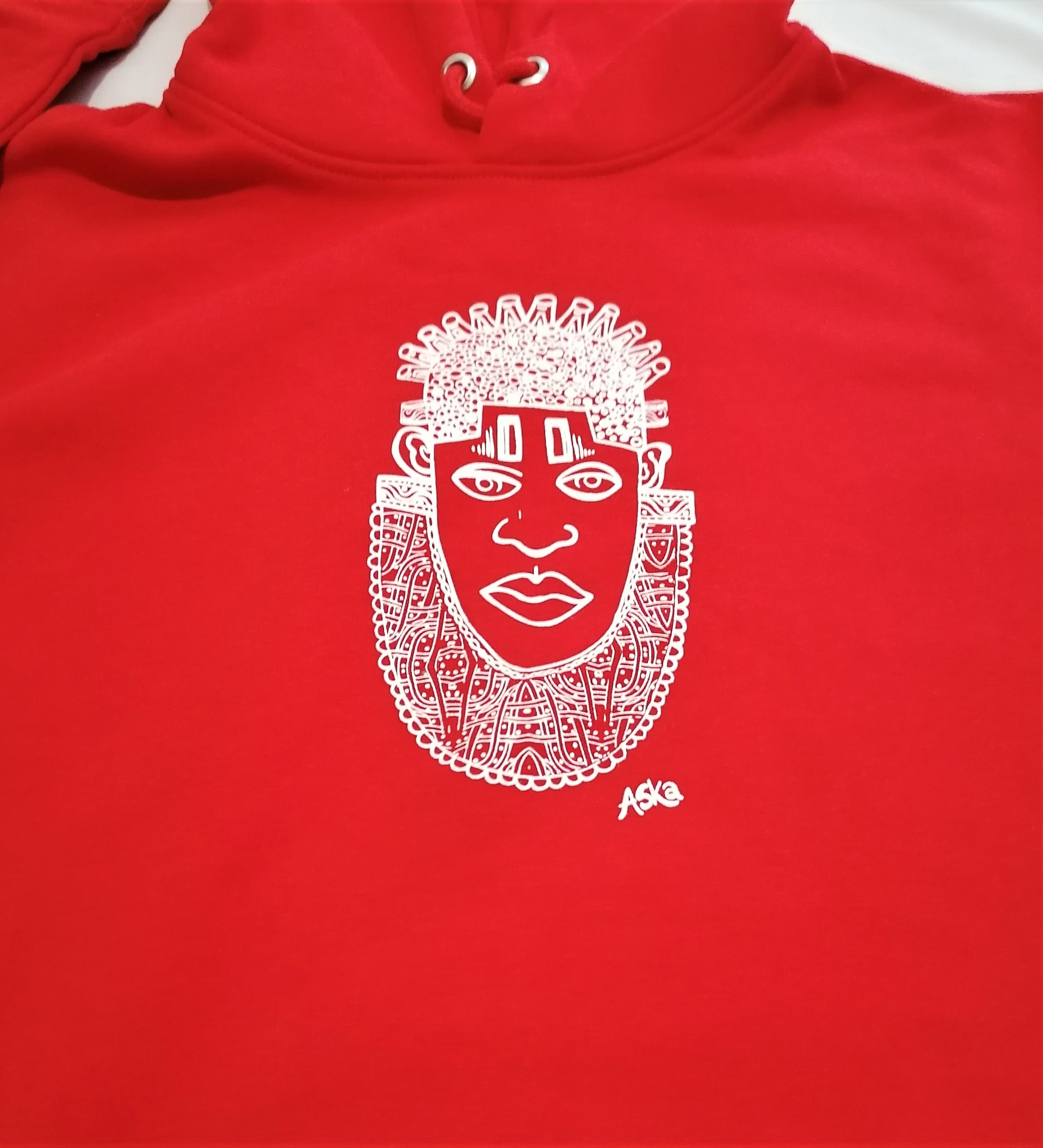 IDIA African Inspired Hoodie in vibrant red featuring white screen printed art of Queen IDIA, showcasing cultural heritage and contemporary fashion.