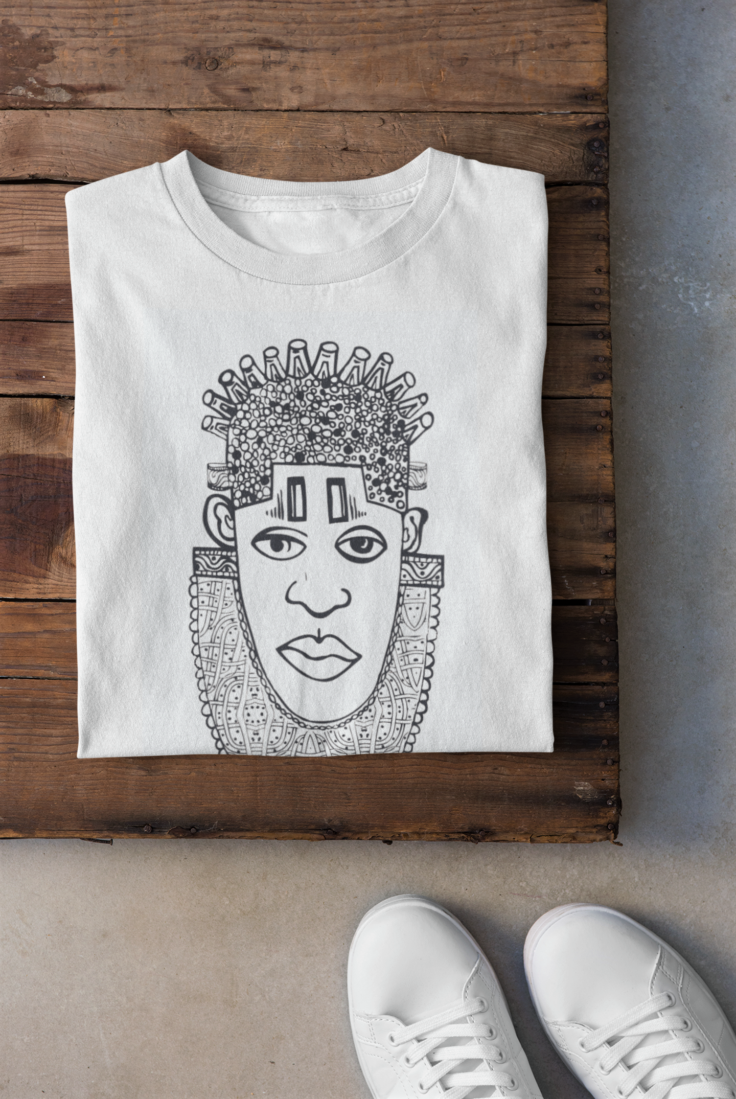 IDIA Art Earth Positive Tee featuring Queen IDIA design in black on white, made from 100% organic cotton.