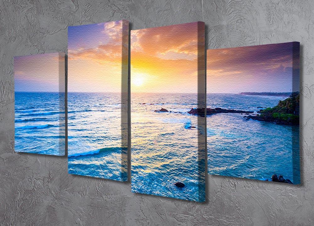 A beautiful 4-split canvas artwork depicting a sunset over the Indian Ocean, showcasing vibrant colors and serene ocean waves.